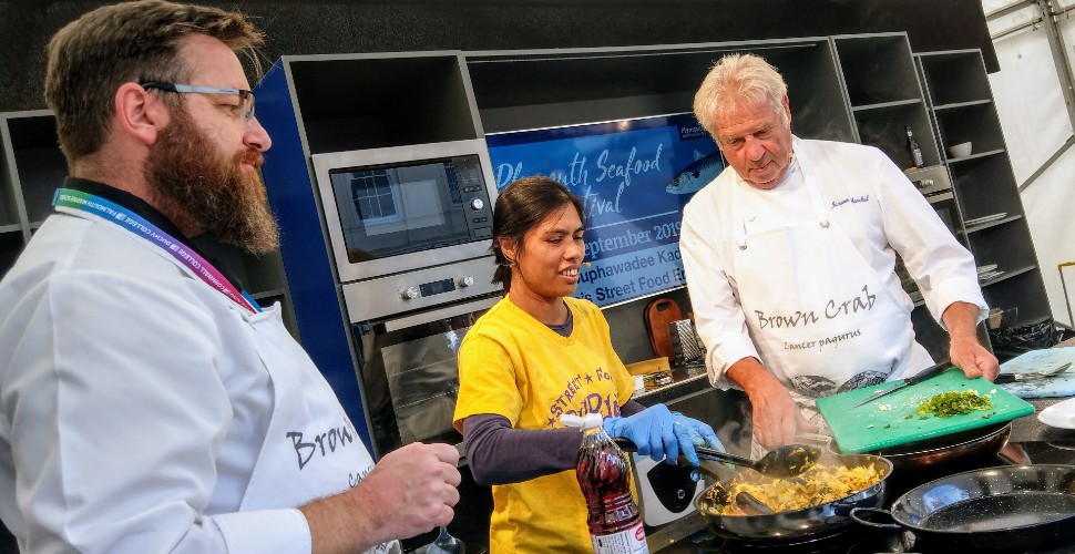 Chefs on stage in the Cookery Theatre 